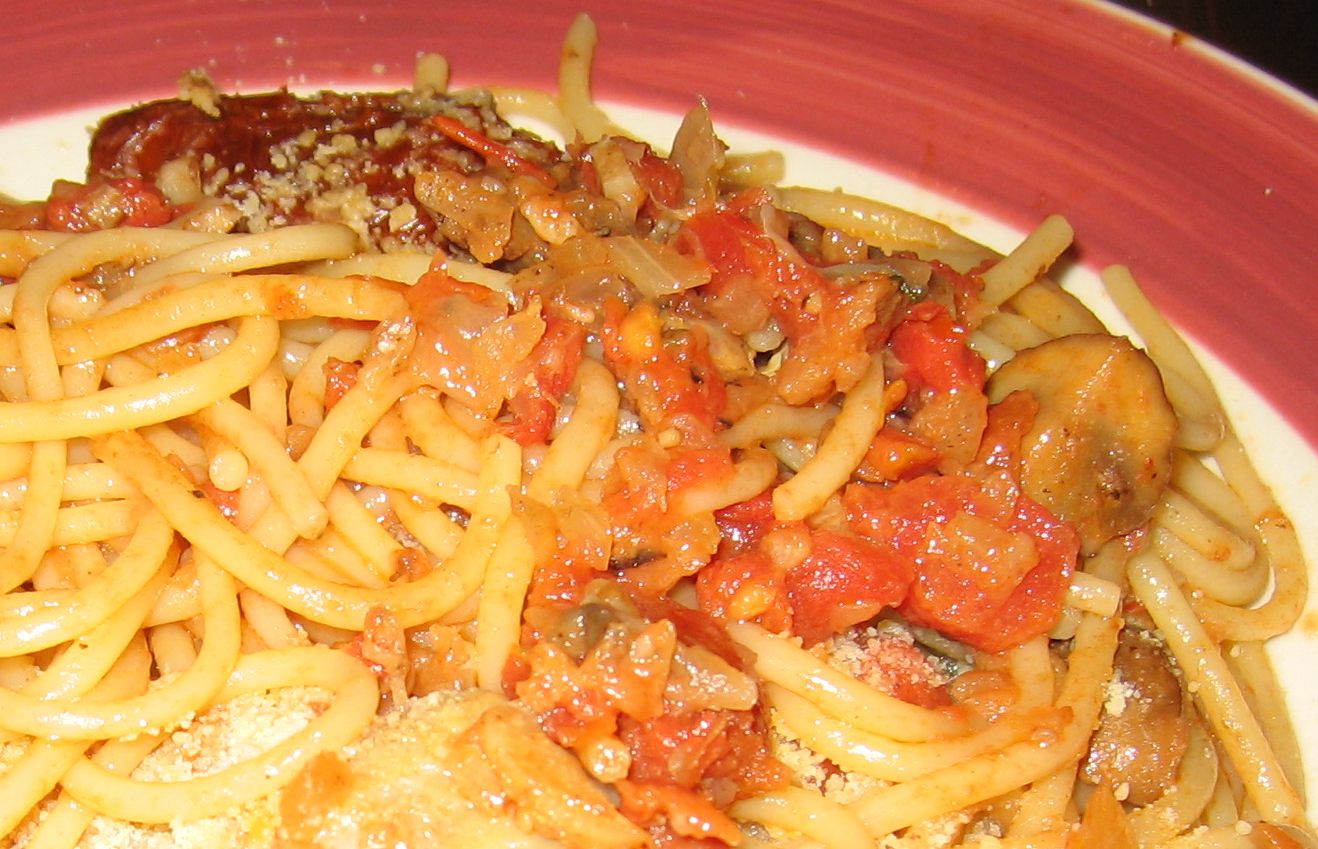 Spaghetti with tomato, basil, and mushroom sauce